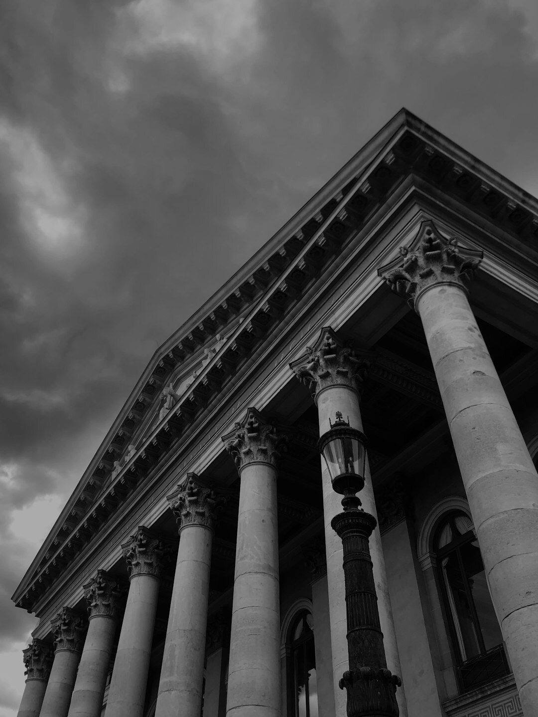 Mystery novel cover with an old courthouse building
